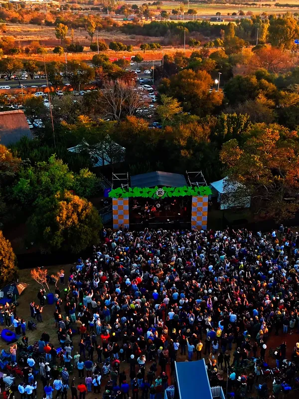 Golden-hour aerial of the Capital Craft main stage crowd