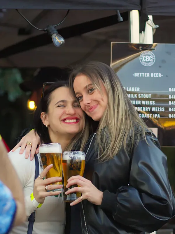 Friends with CBC beers at the stand