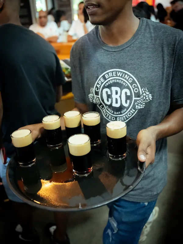 A tray of CBC stouts on its way to the tables