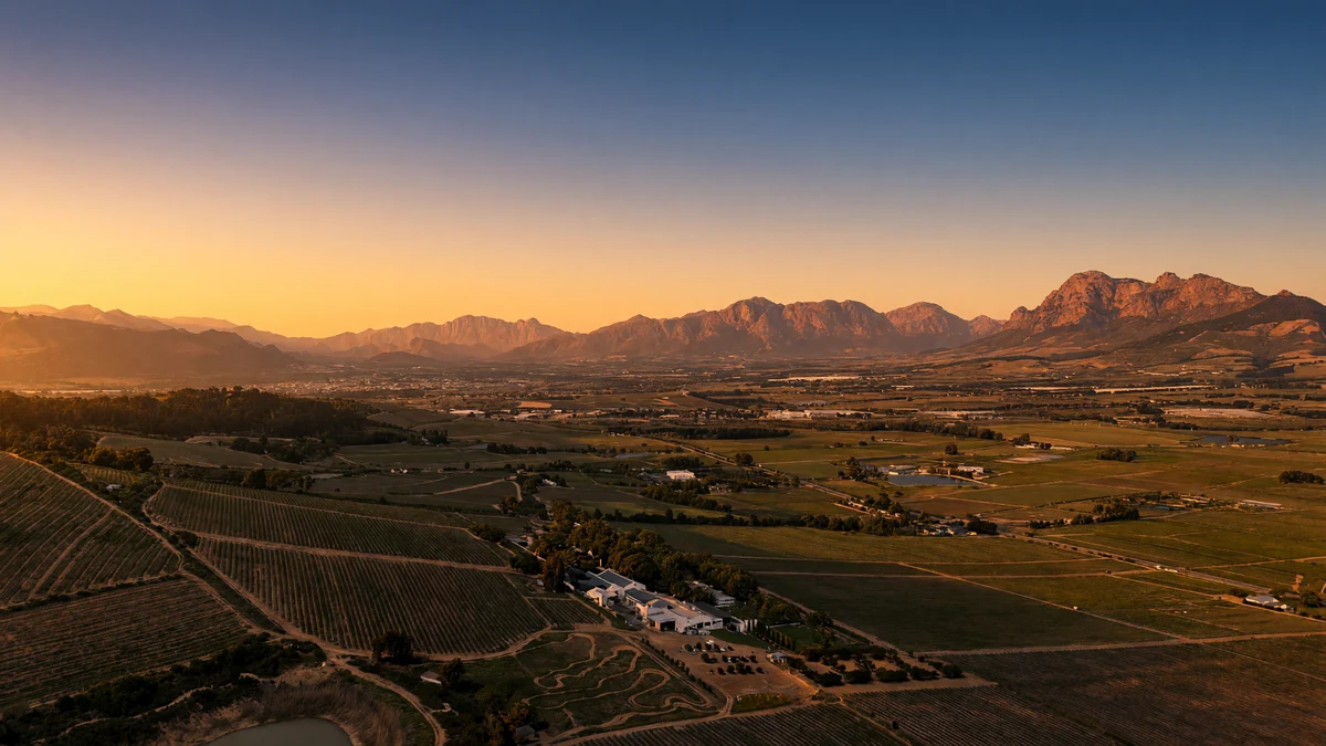 The Boland winelands and mountains at sunset, from above Spice Route Farm