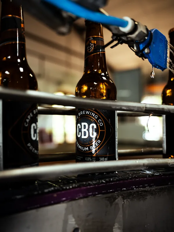 Filled CBC bottles on the line